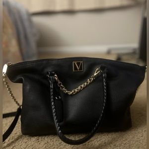 Victoria’s Secret black purse. Lightly used.